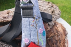 Beuteltasche mit loxx Knopf